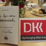 Powiększ zdjęcie Otwarta książka i logo DKK